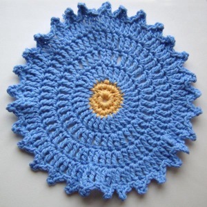 photo of crocheted cotton aster washcloth
